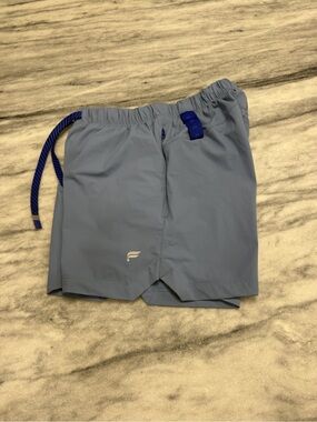 Men’s small Fabletics light blue shorts